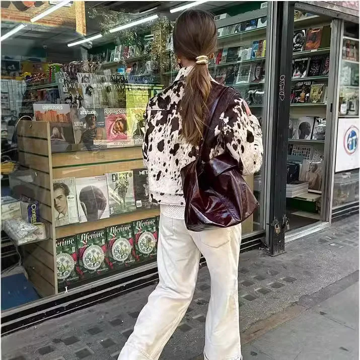 Damen Kurz geschnittene Western‑inspiriere Jacke mit Kuhflecken‑Felloptik und Brusttaschen Drune