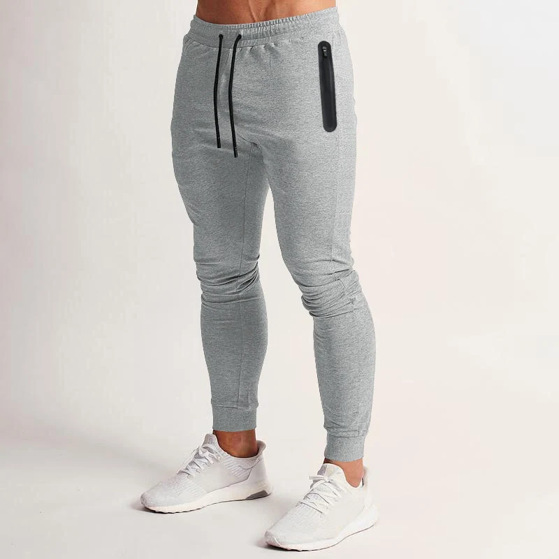 Herren schmal geschnittene Jogginghose mit Reißverschlusstaschen und Kordelzug Drune