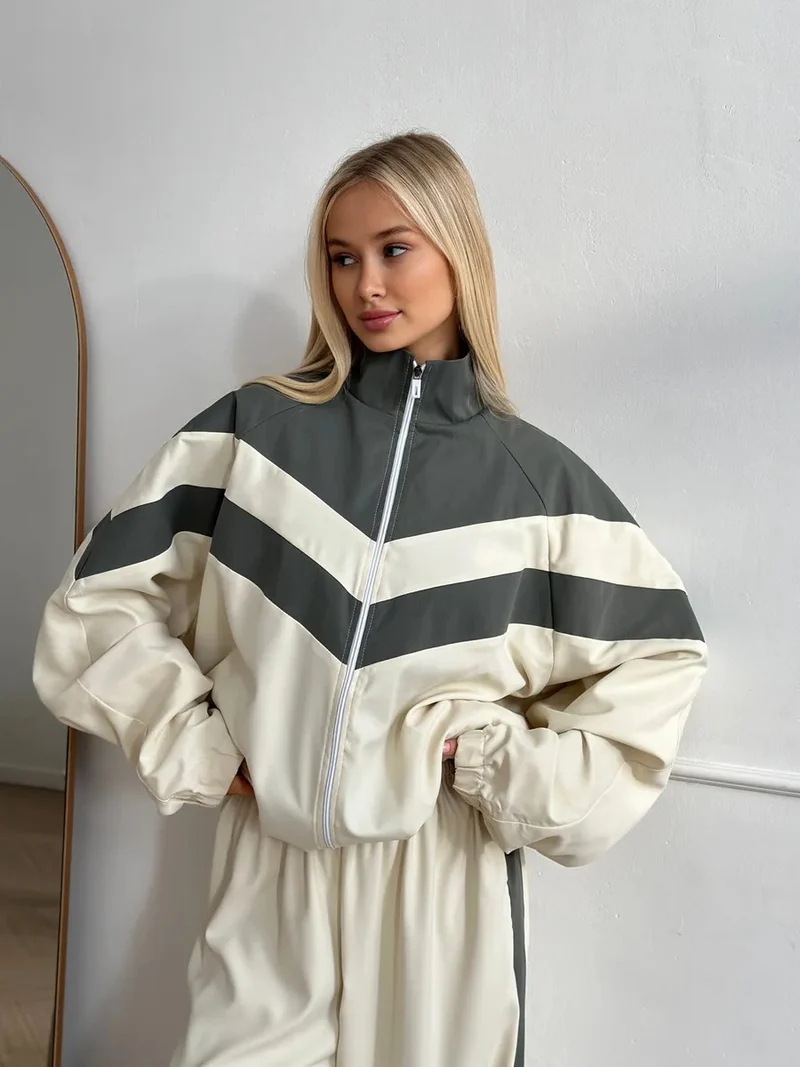 Damen sportliche Windbreaker-Jacke mit hohen Kragen und kontrastierenden Streifen Drune