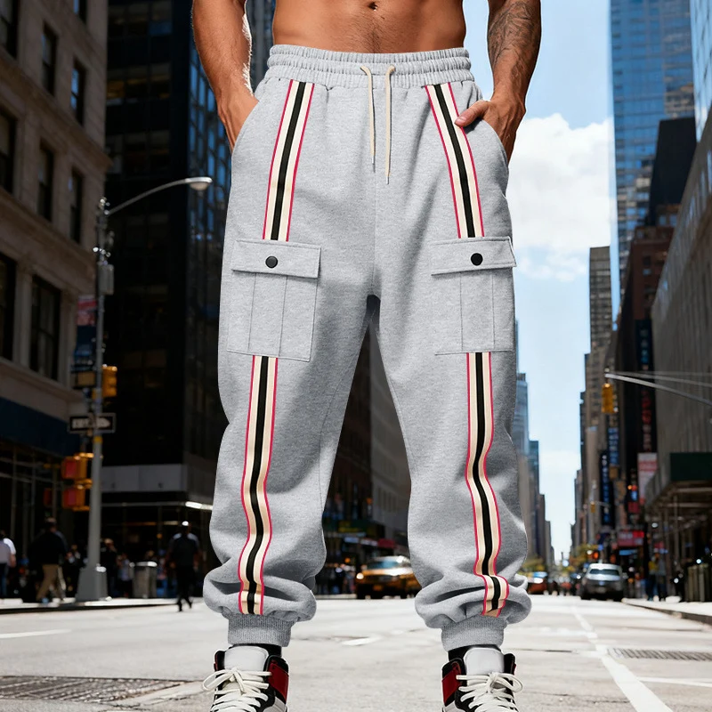 Herren Cargo-Jogginghose im Urban-Streetwear-Look mit Kontraststreifen und Klappentaschen Drune