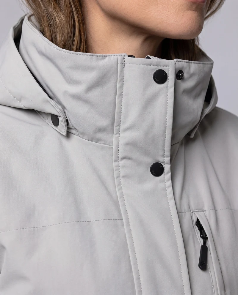 Damen Leichte Wasserdichte Parka mit Kapuze, Stehkragen und Taillierter Passform Drune