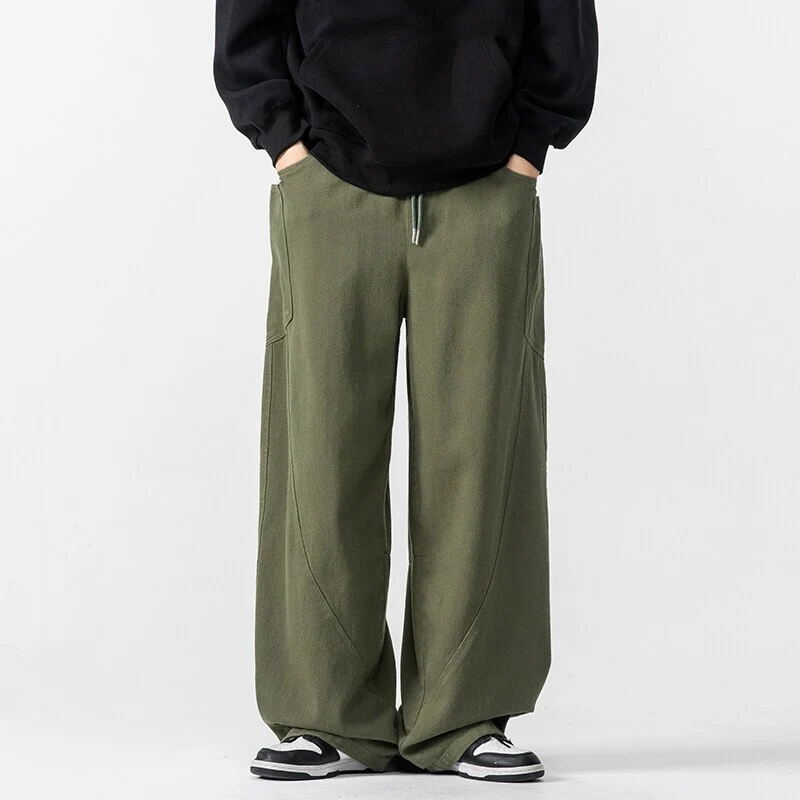 Herren Weite Loungehose mit Tunnelzug, aufgesetzten Taschen und markanten Panelnähten Drune