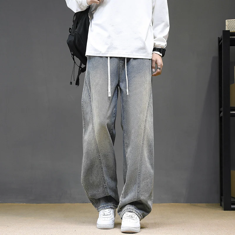 Herren Weite Denim‑Baggy‑Jeans mit Tunnelzugbund, tiefem Schritt und markanten Ziernähten Drune