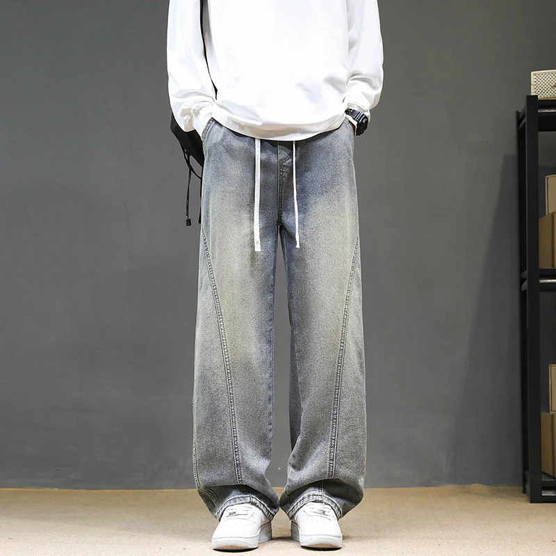 Herren Weite Denim‑Baggy‑Jeans mit Tunnelzugbund, tiefem Schritt und markanten Ziernähten Drune