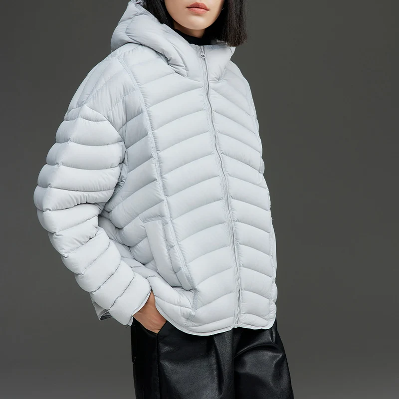 Damen Ultraleichte gesteppte Daunenjacke mit Kapuze und winddichter Außenhülle Drune