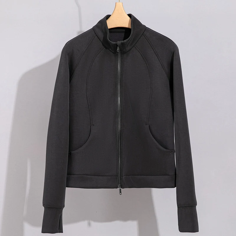 Damen Performance-Trainingsjacke mit Stehkragen und Daumenloch Drune