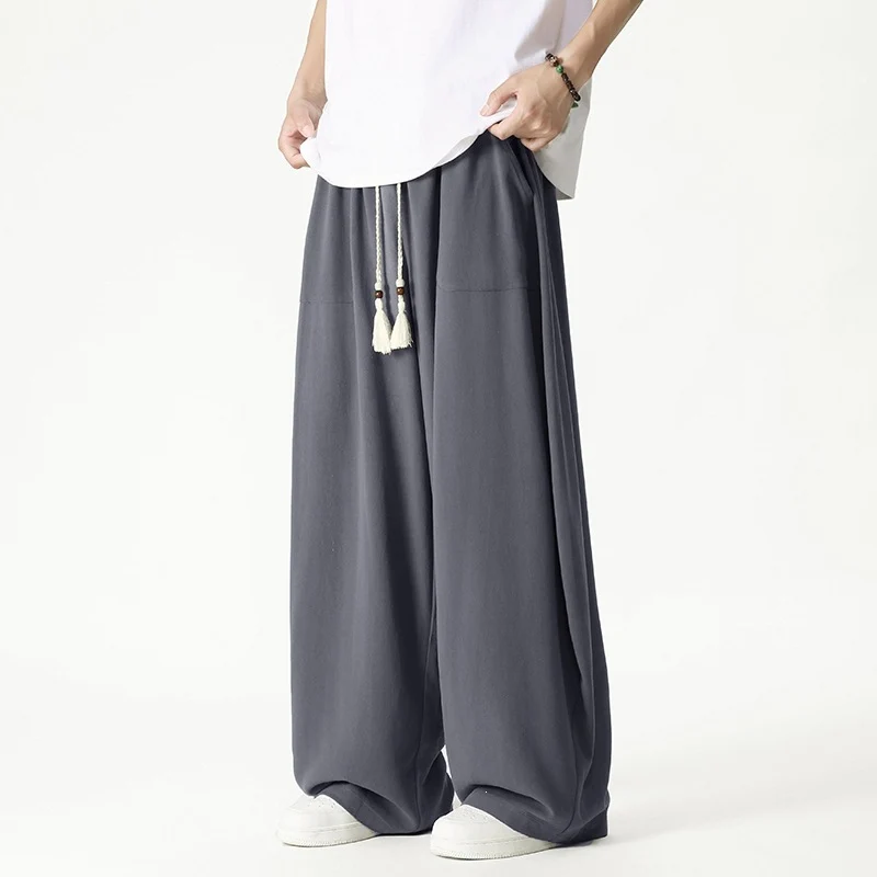 Herren Weit geschnittene Lounge-Hose mit Quasten-Kordel, elastischem Bund und aufgesetzten Taschen Drune