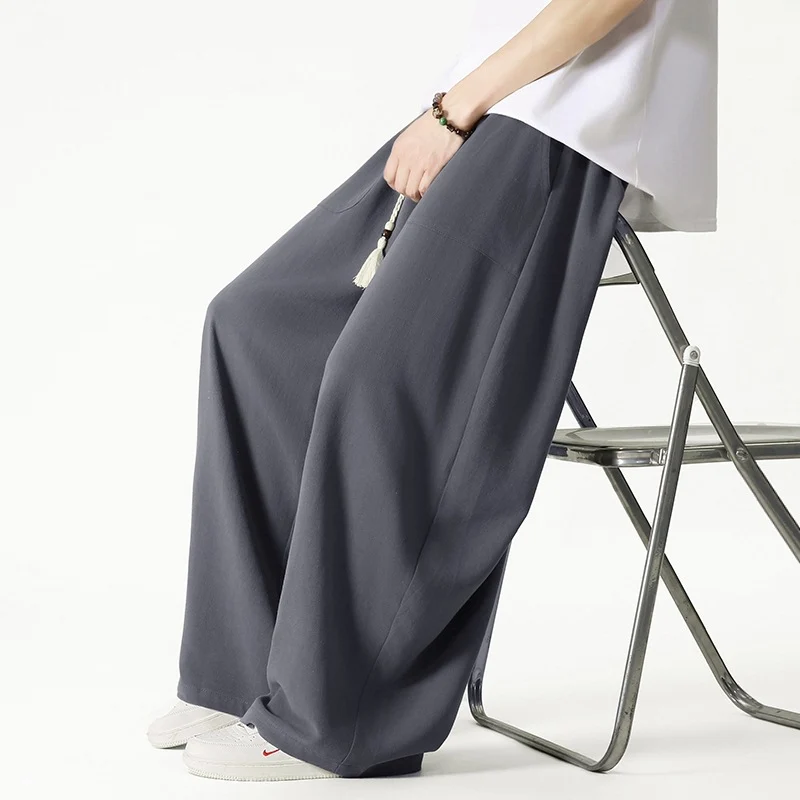 Herren Weit geschnittene Lounge-Hose mit Quasten-Kordel, elastischem Bund und aufgesetzten Taschen Drune