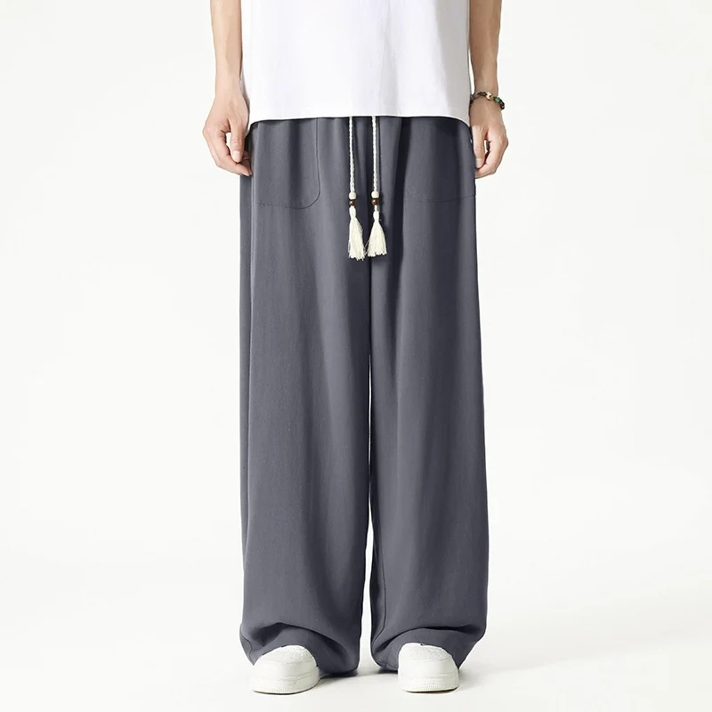 Herren Weit geschnittene Lounge-Hose mit Quasten-Kordel, elastischem Bund und aufgesetzten Taschen Drune
