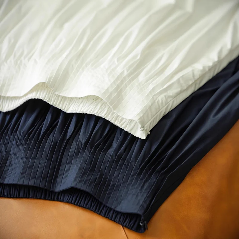 Damen Midirock mit hoch angesetztem Faltenbund und weitem, gerafftem Volumen Drune