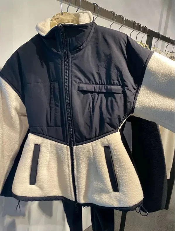Damen Hybrid-Fleecejacke mit wattiertem Oberteil, Stehkragen und tailliertem Schößchen Drune