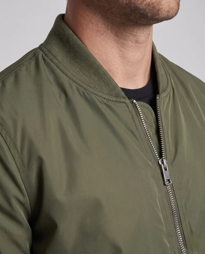 Herren isolierte Pilot-Bomberjacke im Aviation-Stil mit Ärmeltasche und gerippten Bündchen Drune