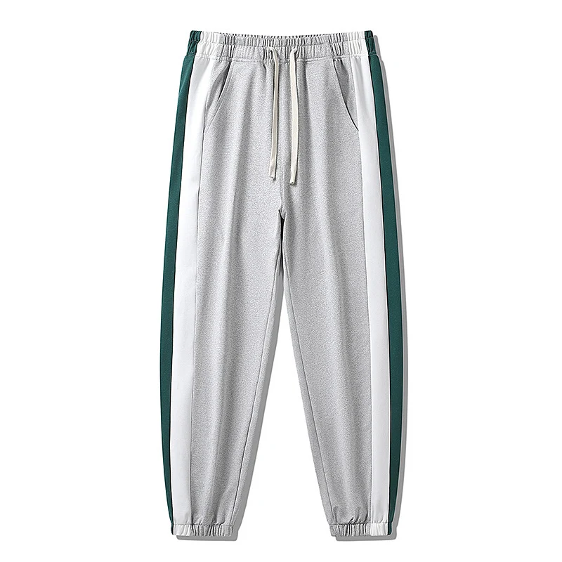 Herren Konische Trackhose mit Kordelzug, seitlichen Colorblock‑Streifen & elastischen Bündchen Drune