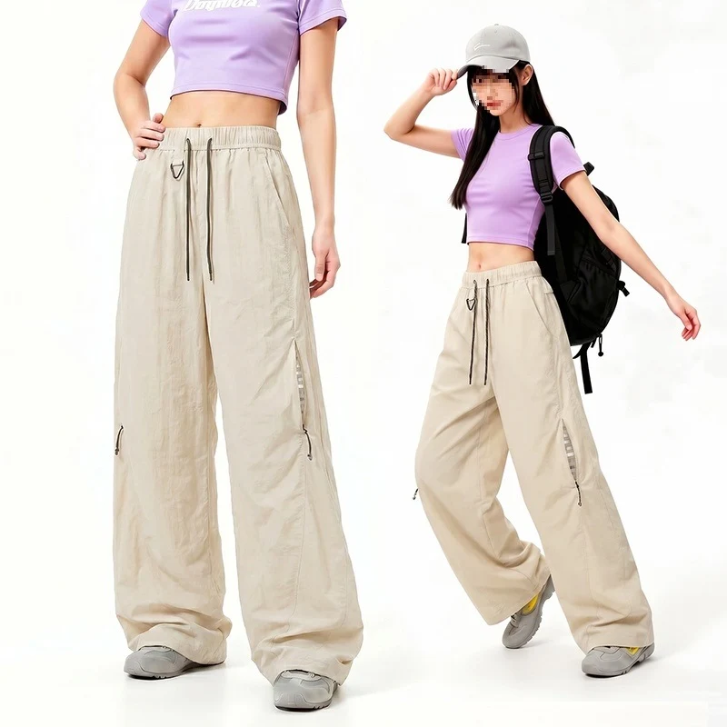 Damen Oversize Tech-Loungehose mit Kontrastnähten, reflektierenden Reißverschlusstaschen & Kordelbund Drune