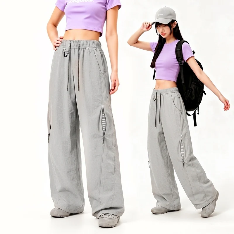 Damen Oversize Tech-Loungehose mit Kontrastnähten, reflektierenden Reißverschlusstaschen & Kordelbund Drune