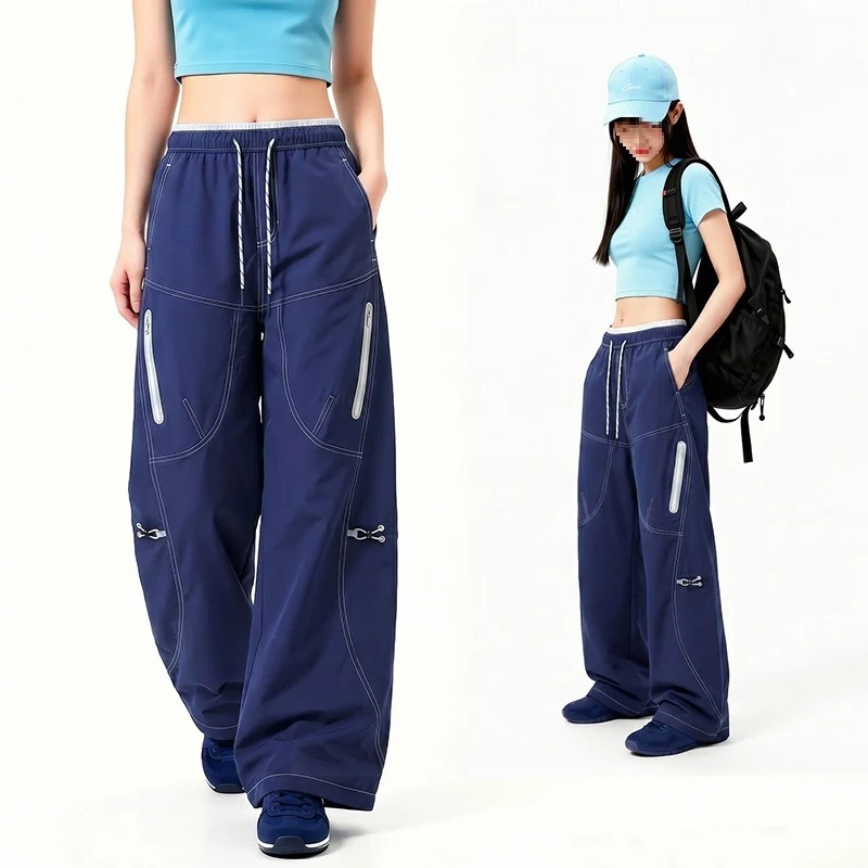 Damen Oversize Tech-Loungehose mit Kontrastnähten, reflektierenden Reißverschlusstaschen & Kordelbund Drune