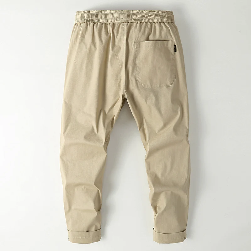 Herren Elastische Chino-Jogger mit tailliertem Tapered-Schnitt und aufgesetzter Gesäßtasche Drune