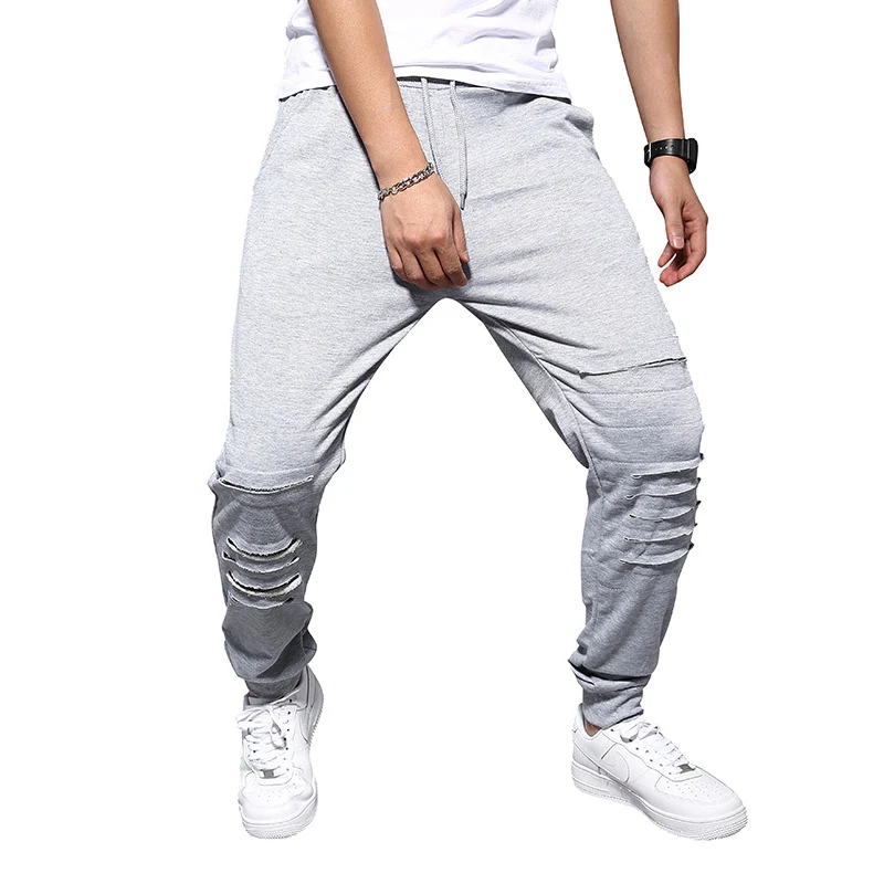 Herren Jogginghose mit tiefem Schritt, Distressed-Knieeinsatz und schmal zulaufendem Bein Drune