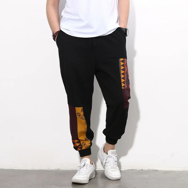 Herren Jogginghose mit seitlichen Panel-Prints, Tunnelzug und gerippten Bündchen Drune