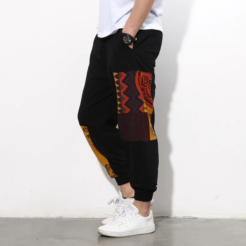 Herren Jogginghose mit seitlichen Panel-Prints, Tunnelzug und gerippten Bündchen Drune