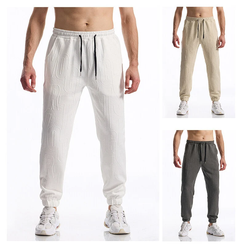 Herren Jogginghose mit elastischem Bund, Tunnelzug und geprägtem Allover‑Logo‑Relief Drune