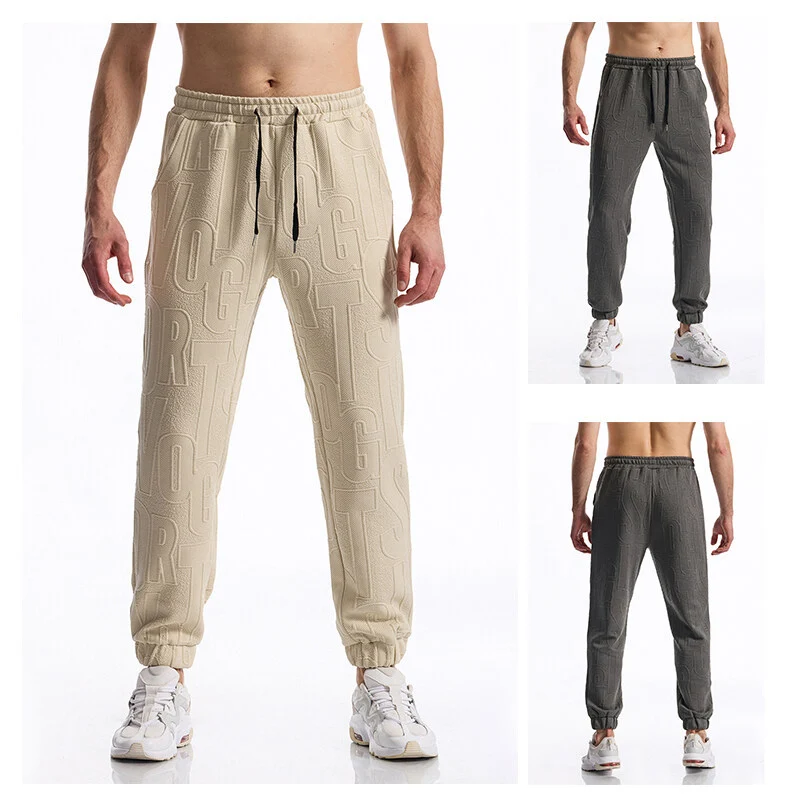 Herren Jogginghose mit elastischem Bund, Tunnelzug und geprägtem Allover‑Logo‑Relief Drune
