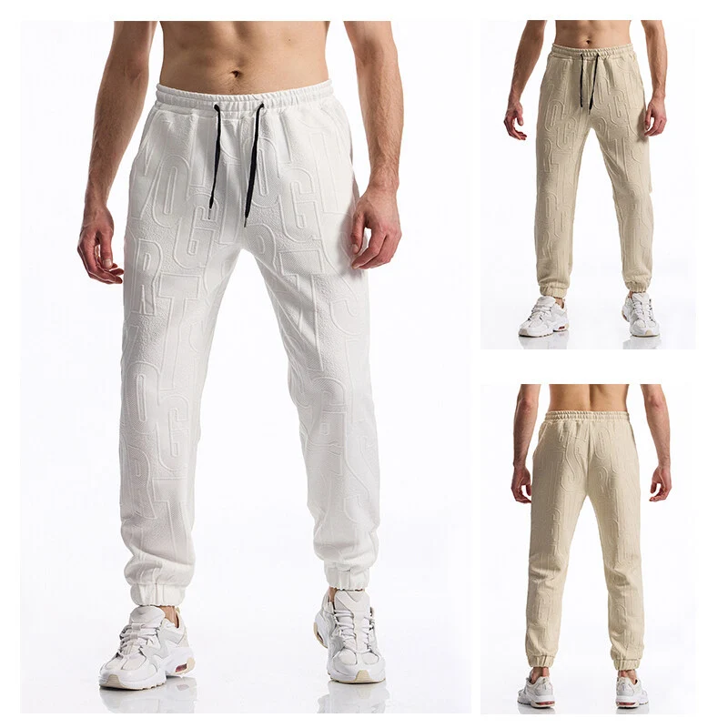 Herren Jogginghose mit elastischem Bund, Tunnelzug und geprägtem Allover‑Logo‑Relief Drune
