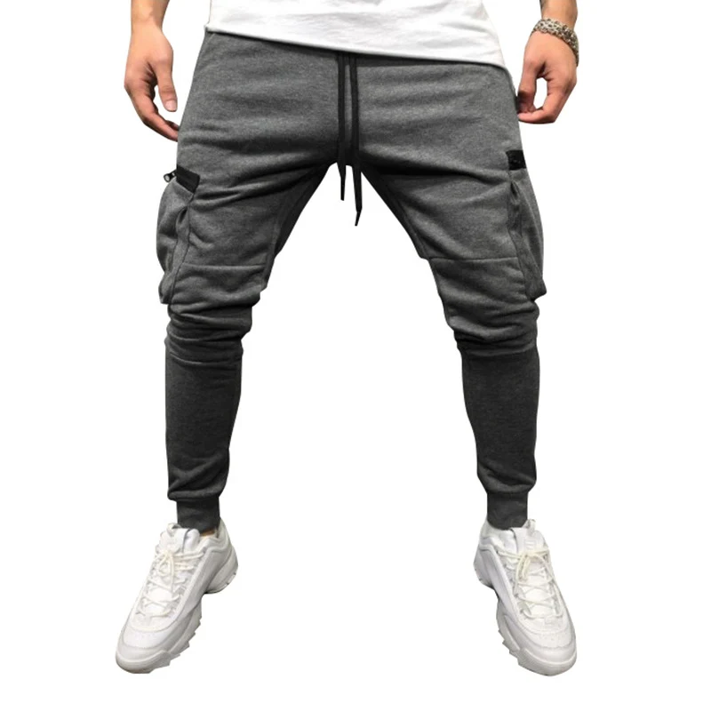 Herren Jogginghose im Drop-Crotch‑Streetwear‑Look mit Cargo‑Taschen und schmalem Bein Drune