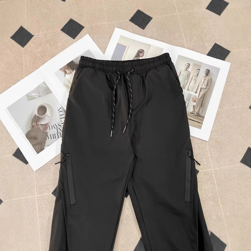 Unisex Sportliche Jogginghose mit verstellbarem Bund und Seitentaschen Drune