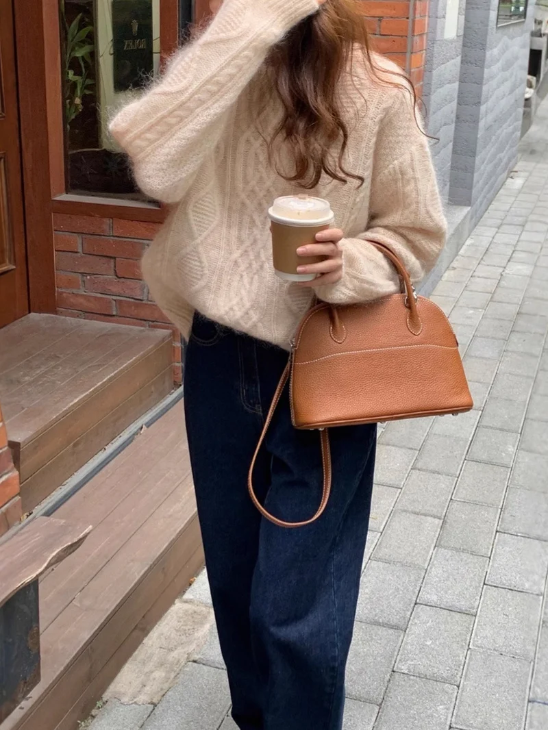 Damen strukturierte Leder‑Handtasche mit abnehmbarem Schulterriemen und gerundeter Korpusform Drune