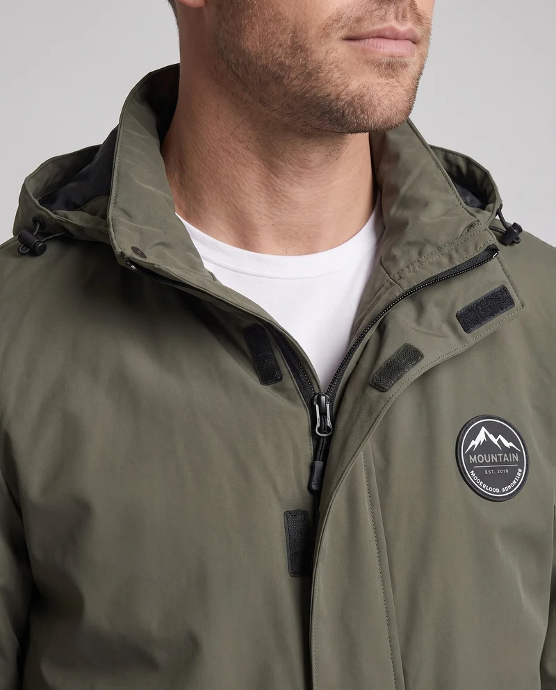 Leichte Utility-Feldjacke für Herren mit Kapuze und Armtasche Drune