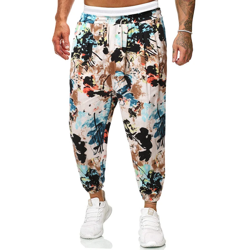 Herren Locker sitzende Patchwork-Loungehose mit Tunnelzug, elastischen Knöcheln und dekorativem Allover-Print Drune