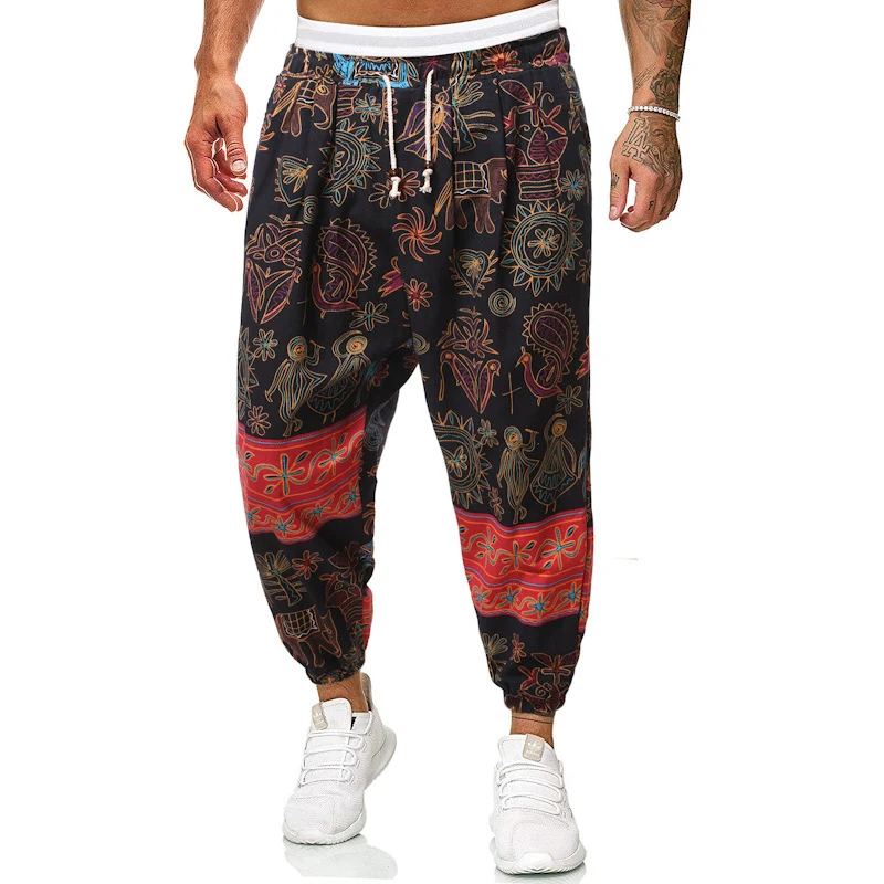 Herren Locker sitzende Patchwork-Loungehose mit Tunnelzug, elastischen Knöcheln und dekorativem Allover-Print Drune