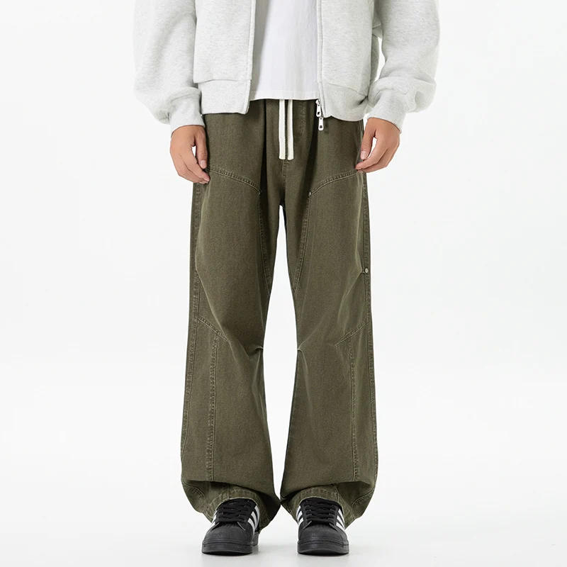 Herren weite Baggy-Cargohose aus gewaschenem Canvas mit Elastikbund und dekorativen Nahtpaneelen Drune