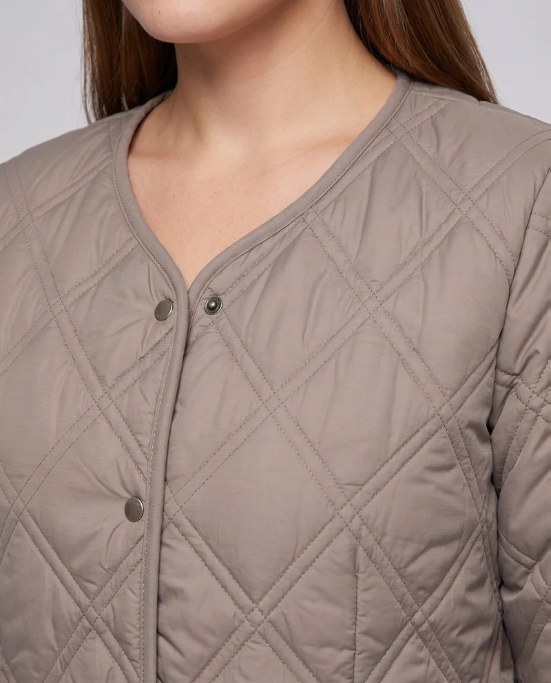 Damen gesteppte Jacke mit Teddy-Futter und Druckknopfverschluss