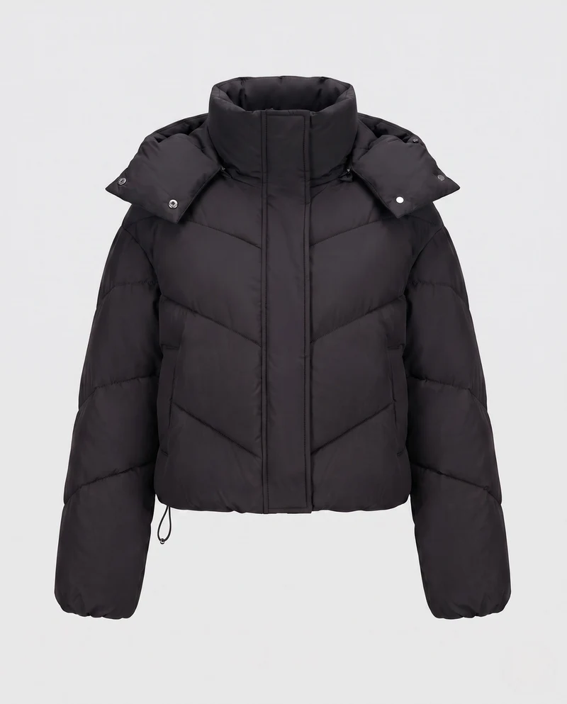 Damen cropped gesteppte Jacke mit hohem Schalkragen, asymmetrischer Zickzack-Steppung und verstellbarem Kordelzugbund.