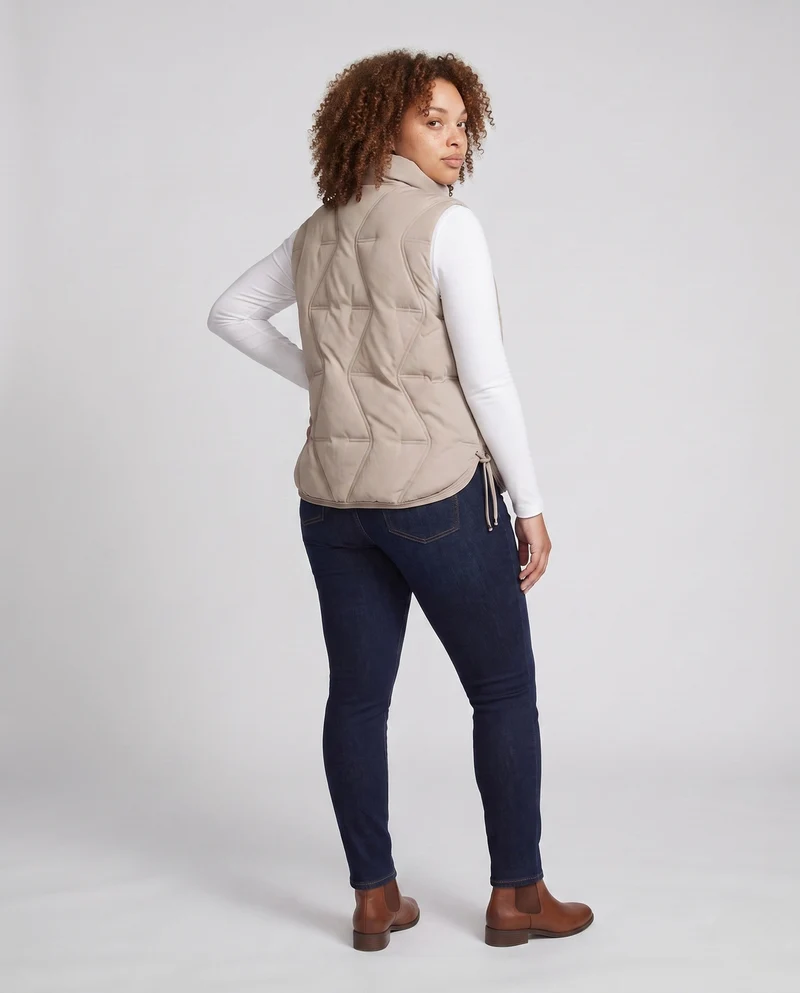 Damen leichte gepolsterte Outdoor gesteppte Weste mit asymmetrischer Frontpartie und seitlichem Kordelzug