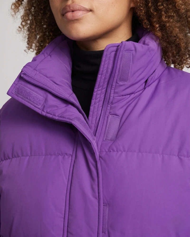 Damen ultraleichte oversized gesteppte Jacke mit hohem Stehkragen und elastischem Saum