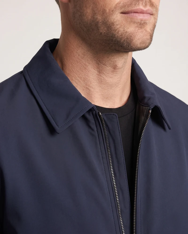 Herren gesteppte Daunenjacke mit minimalistischer Außenschale und Stehkragen