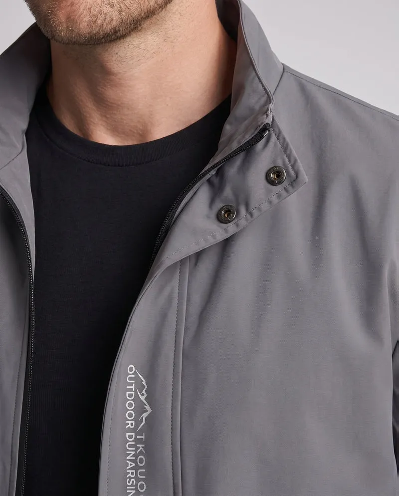 Leichter Mikrofaser-Windbreaker für Herren mit Stehkragen, wasserabweisender Oberfläche und verdeckten Taschen