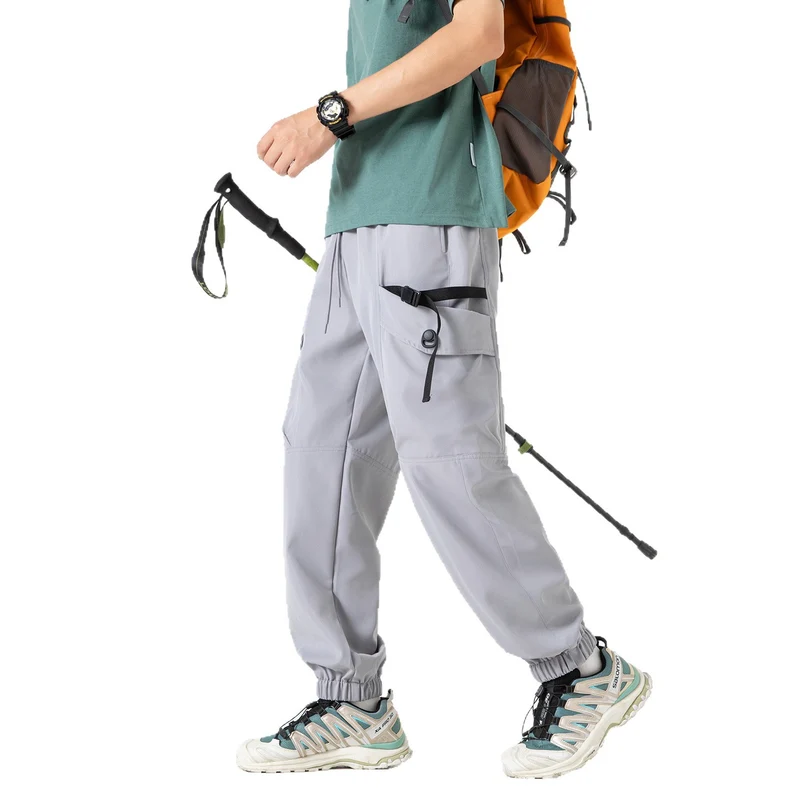 Unisex Weite Technical-Cargo-Jogginghose mit verstellbarem Tunnelzug, großen Klapptaschen und elastischem Knöchelabschluss Drune