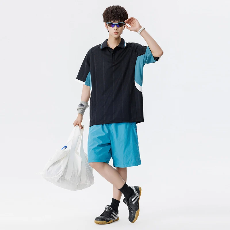 Unisex Boxy Oversize Polo-Shirt aus technischem Funktionsjersey mit Kontrastpaneelen und Raglanärmeln Drune