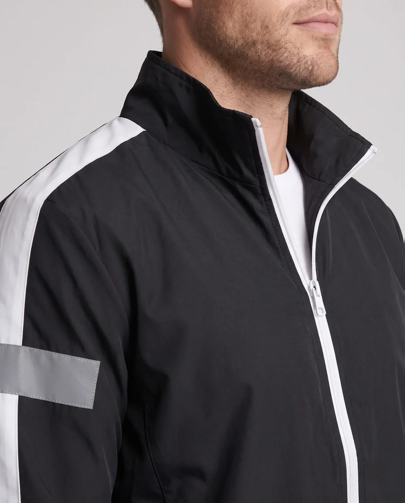 Herren leichter sportlicher Trainingsanzug mit Windbreaker, reflektierenden Einsätzen und schmal zulaufenden Jogginghosen