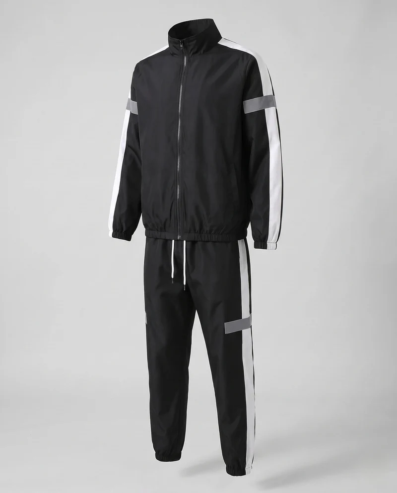 Herren leichter sportlicher Trainingsanzug mit Windbreaker, reflektierenden Einsätzen und schmal zulaufenden Jogginghosen