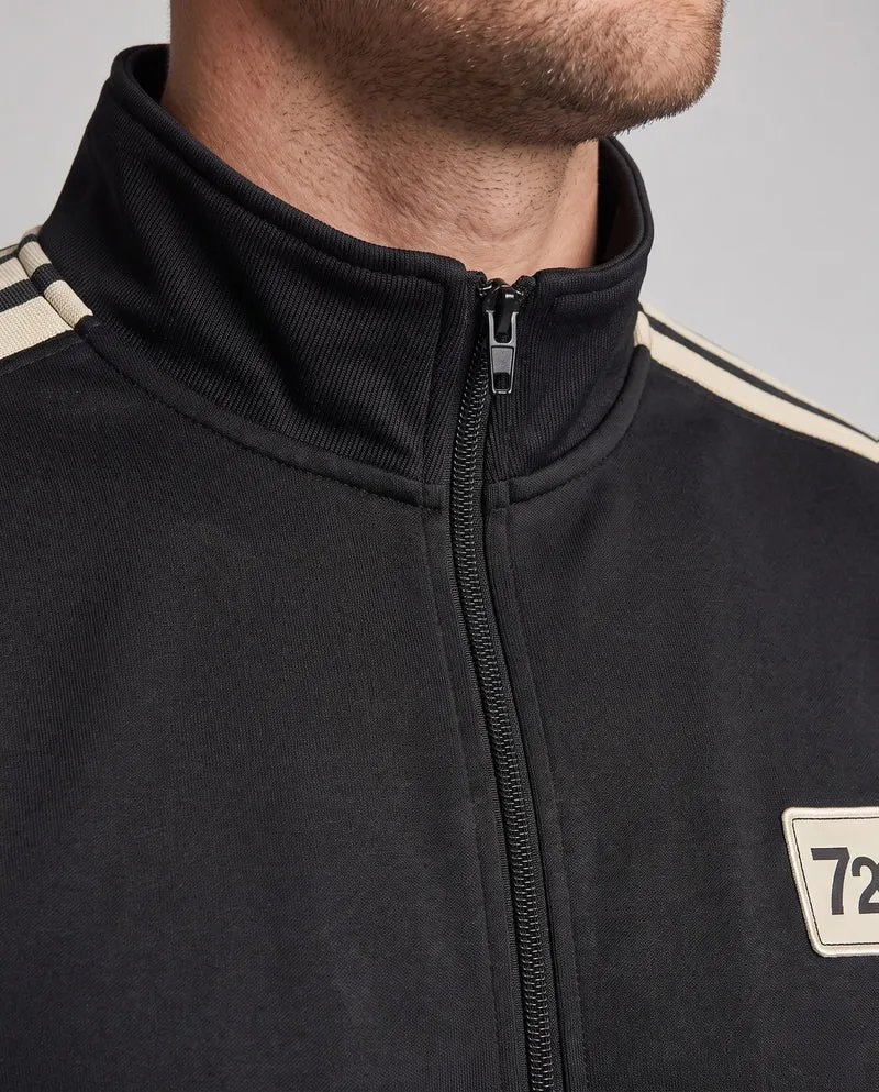 Männliches sportliches Zip-Trainingsset mit Stehkragen, Kontraststreifen und elastischem Bund