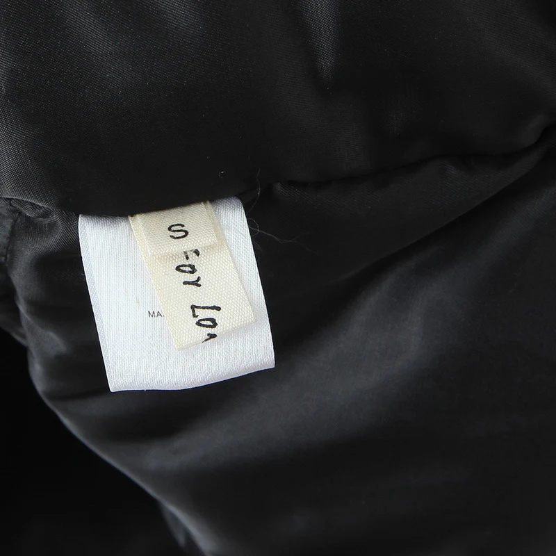Damen Kurze boxy Funktionsjacke mit Kapuze, wattierter Isolierung und diagonalen Reißverschlusstaschen Drune