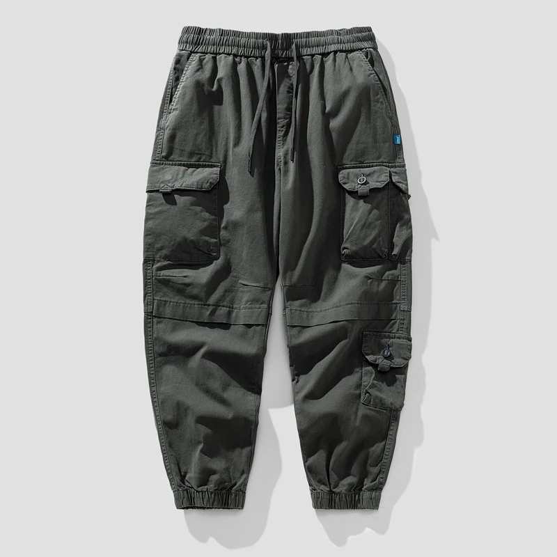 Herren Leichte Canvas-Cargohose im Joggerstil mit elastischem Bund, segmentierten Kniepaneelen und verdeckten Klappentaschen Drune