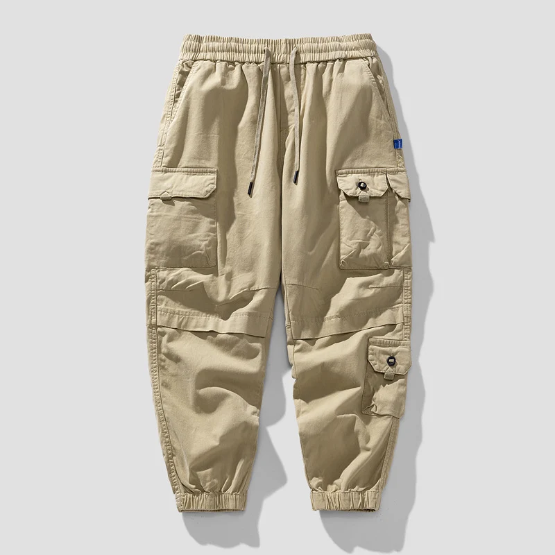 Herren Leichte Canvas-Cargohose im Joggerstil mit elastischem Bund, segmentierten Kniepaneelen und verdeckten Klappentaschen Drune
