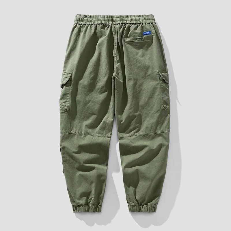Herren Leichte Canvas-Cargohose im Joggerstil mit elastischem Bund, segmentierten Kniepaneelen und verdeckten Klappentaschen Drune