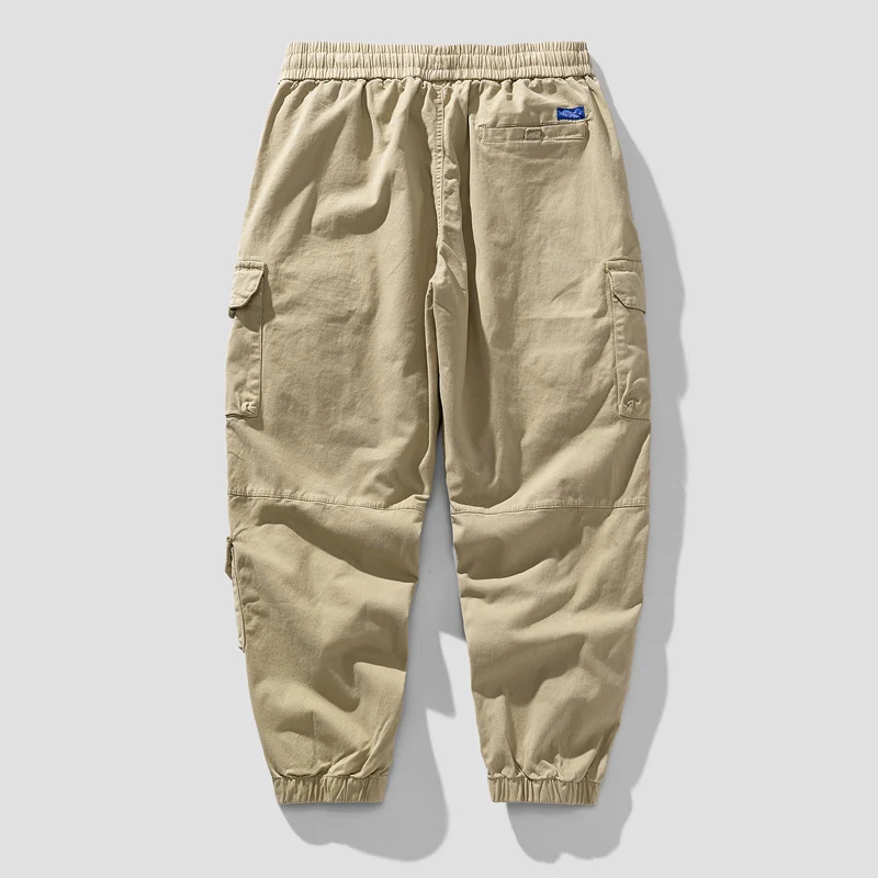 Herren Leichte Canvas-Cargohose im Joggerstil mit elastischem Bund, segmentierten Kniepaneelen und verdeckten Klappentaschen Drune